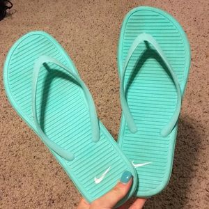 Mint Nike flip flops